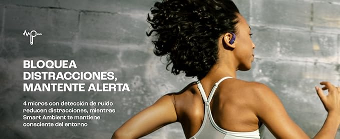 Person wearing ear hook sport headphones from behind during exercise